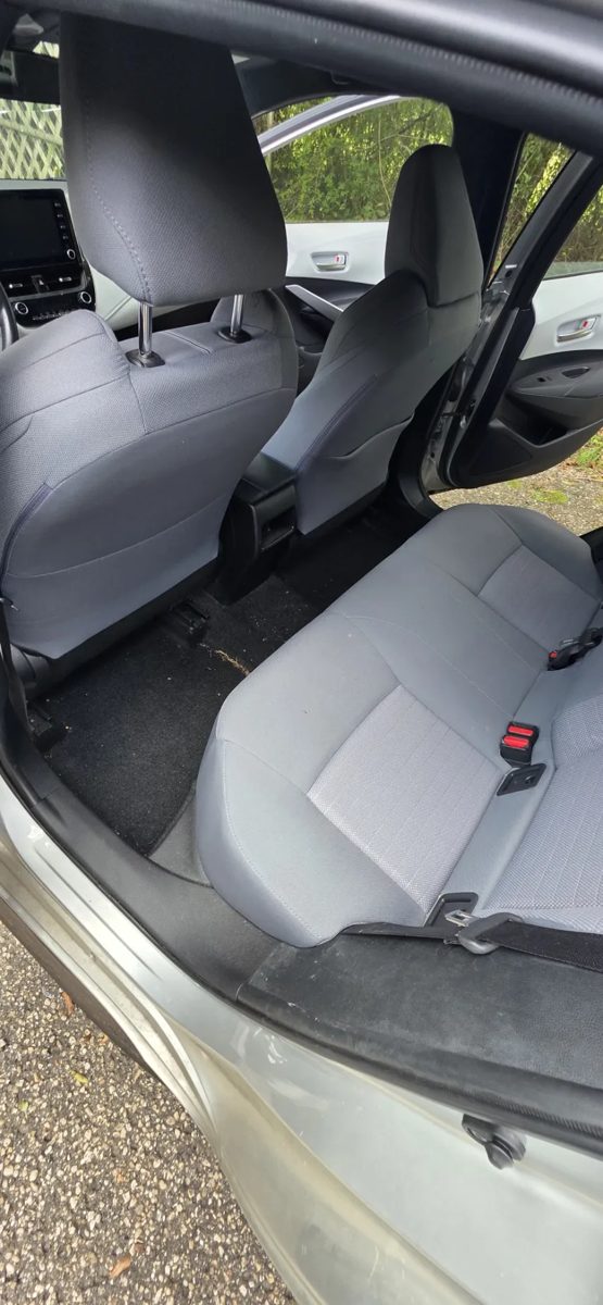 Car back seat with light everyday dirt